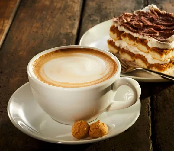 Coffee and a layered dessert