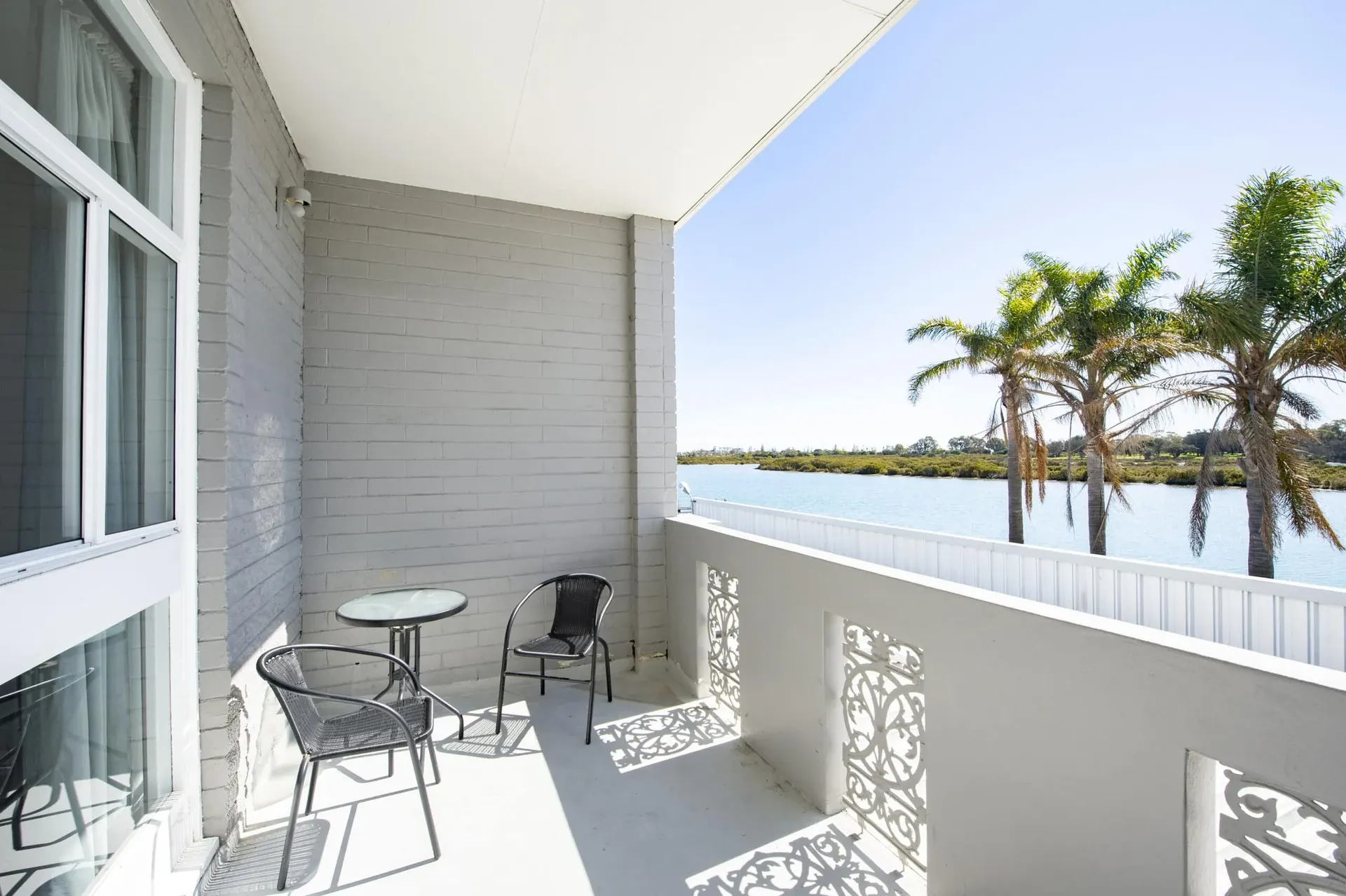 Balcony seating overlooking the water